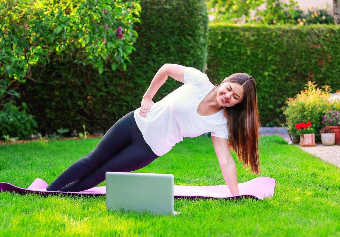 beautiful-young-woman-doing-sport-in-garden-outdoo-2023-11-27-05-31-12-utc