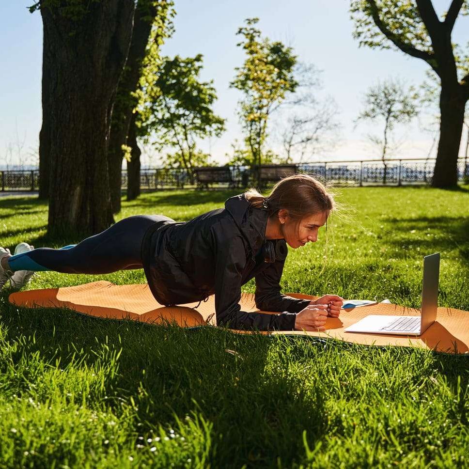 motivated-young-woman-training-core-online-outdoor-2024-10-18-17-30-59-utc