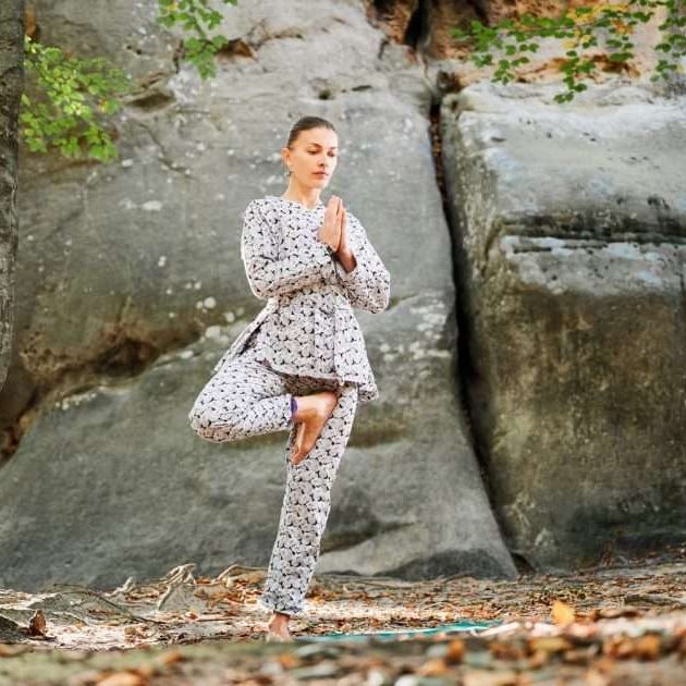 woman-practicing-yoga-outdoors-in-forest-barefoot-2025-01-17-00-07-55-utc