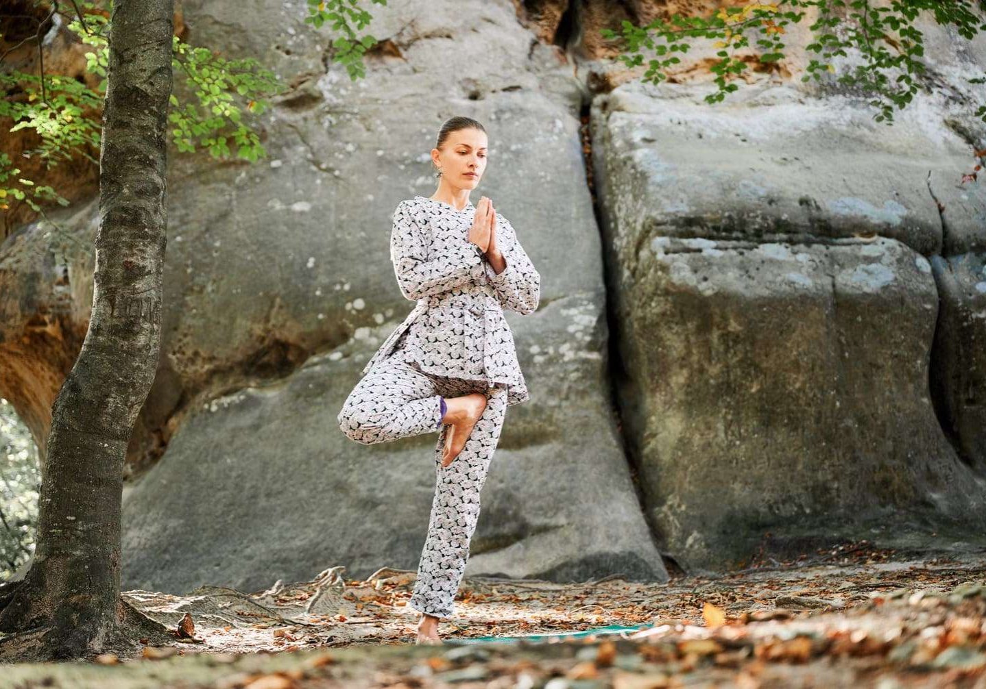 woman-practicing-yoga-outdoors-in-forest-barefoot-2025-01-17-00-07-55-utc